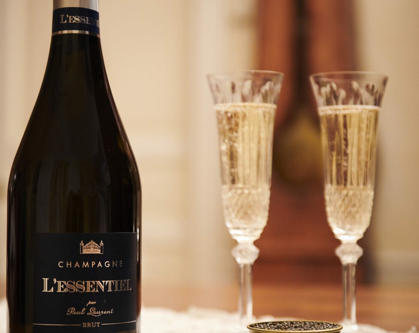 Cuvée L’Essentiel with two crystal champagne glasses